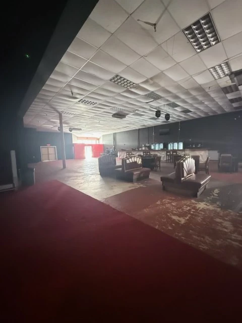 Wide view of the cleared lounge and entrance area